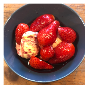 Strawberries in wine with ice cream